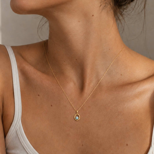 Larimar pendant necklace worn on the collarbone for a minimal everyday look