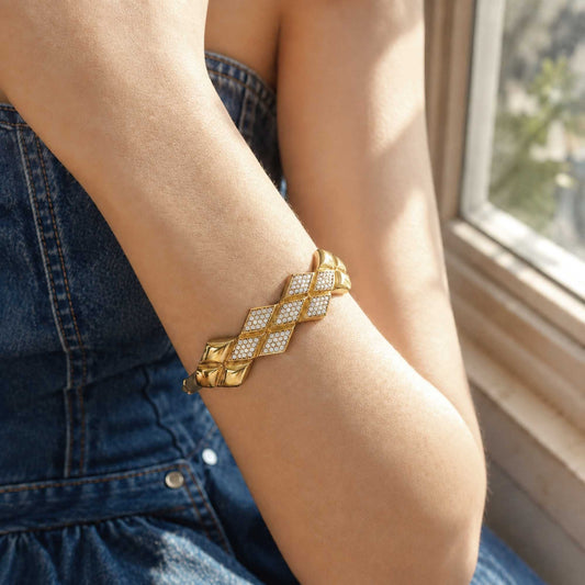 Woven CZ Bangle worn on the wrist with a denim outfit in warm natural window light