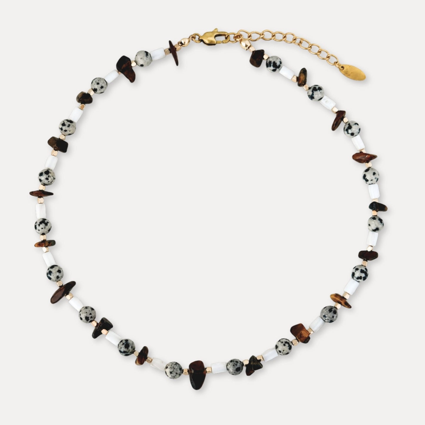 Tiger eye, spotted stone, and shell beaded necklace with gold-tone hardware.
