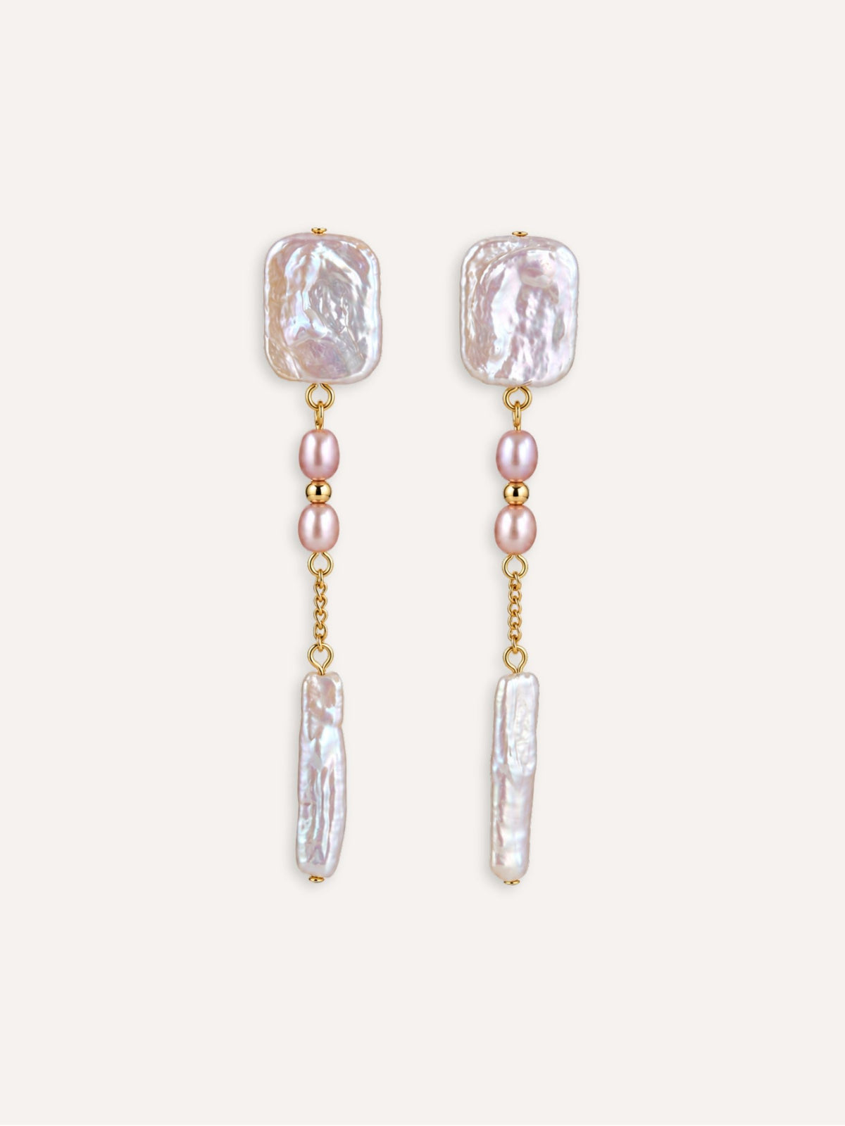 Pair of Cadence baroque pearl drop earrings with pink freshwater pearls and fine gold-filled chains.