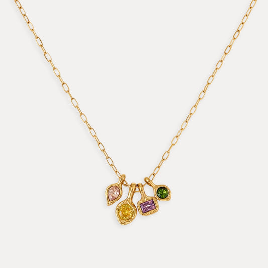 Gold Color Notes Charm Necklace with four pink, yellow, purple and green cubic zirconia pendants