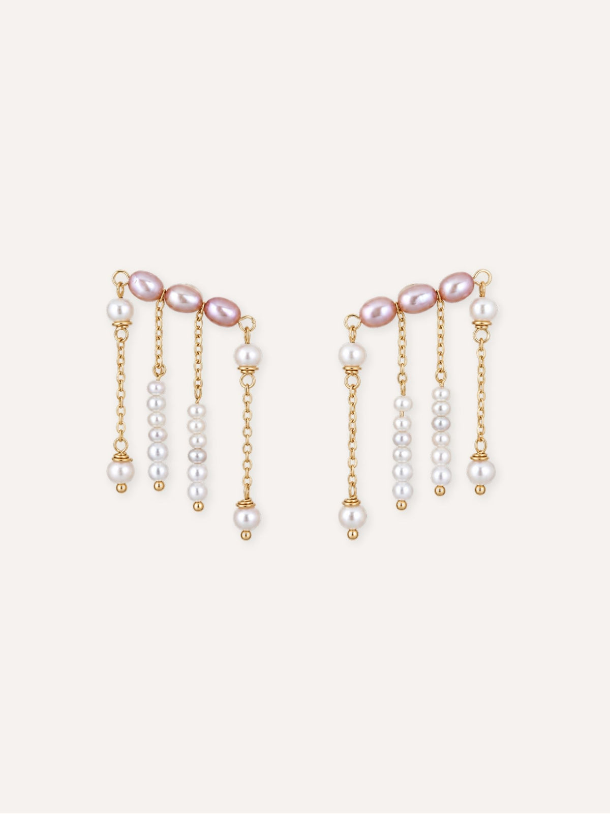 Pair of Contour freshwater pearl ear climber earrings with pink pearls and multiple dangling pearl strands.