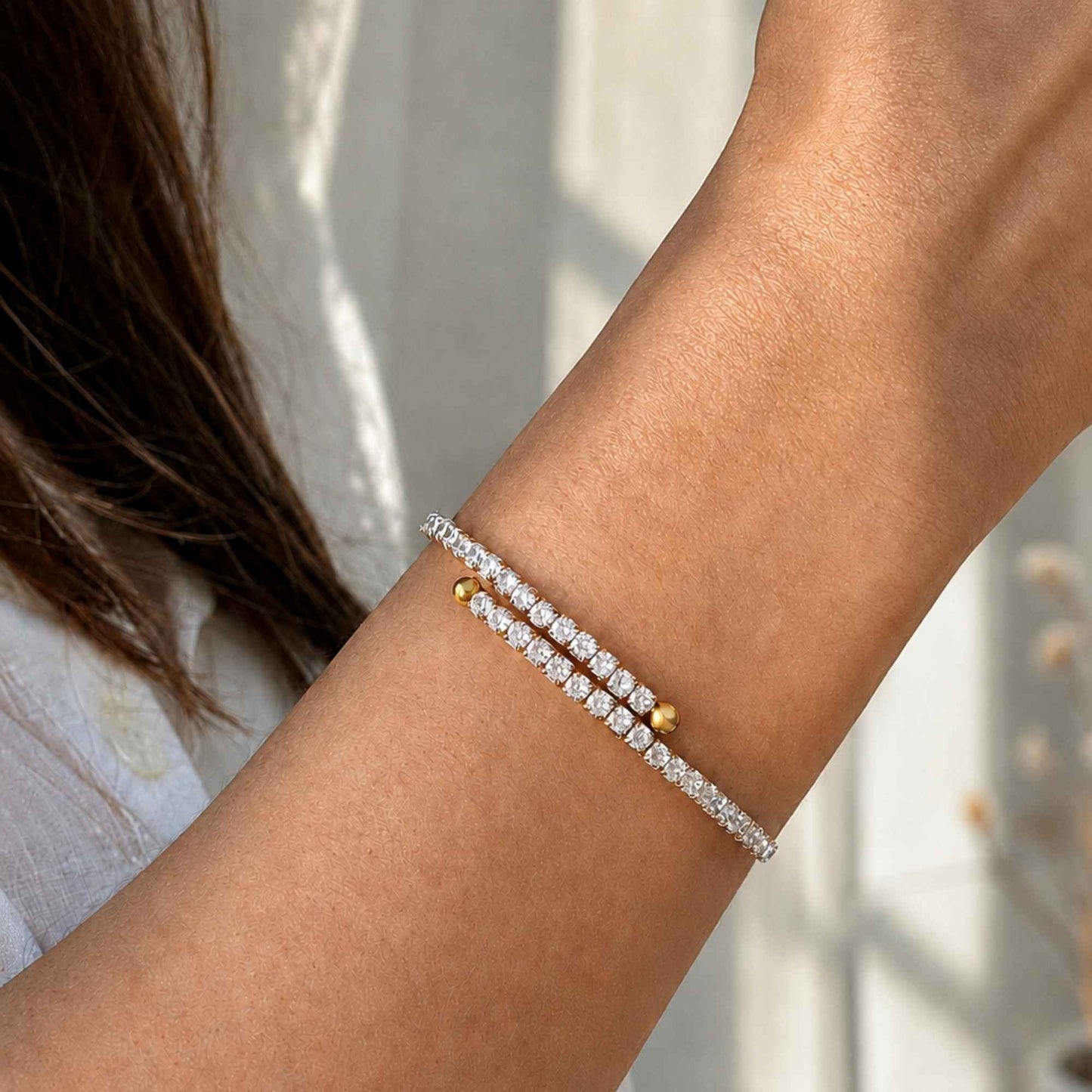 Crossline CZ Bracelet worn on the wrist showing the two overlapping rows of clear cubic zirconia