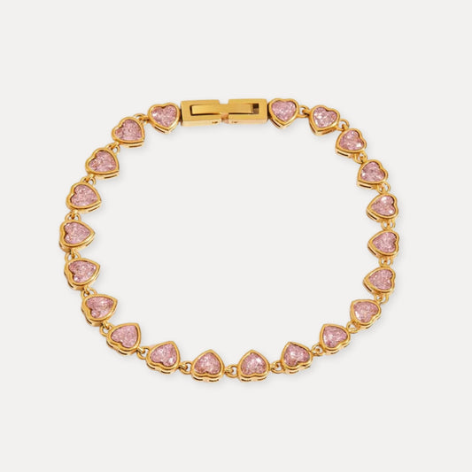 Full view of the Heartline Pink Bracelet with repeating pink cubic zirconia heart links and gold-toned clasp