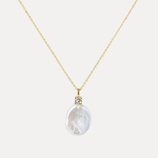 Liora Baroque Pearl Pendant Necklace with a natural freshwater pearl and CZ accent on an 18k gold-plated brass chain