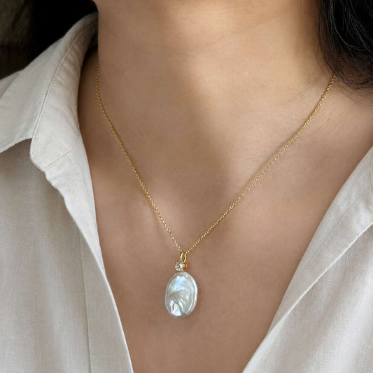Liora Baroque Pearl Pendant Necklace worn with a white shirt for an effortless everyday jewelry look
