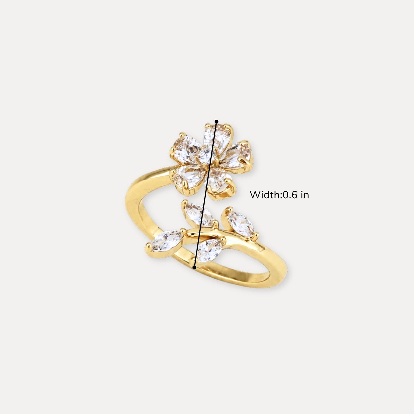 Gold flower and leaf ring showing a 0.6 inch design detail.