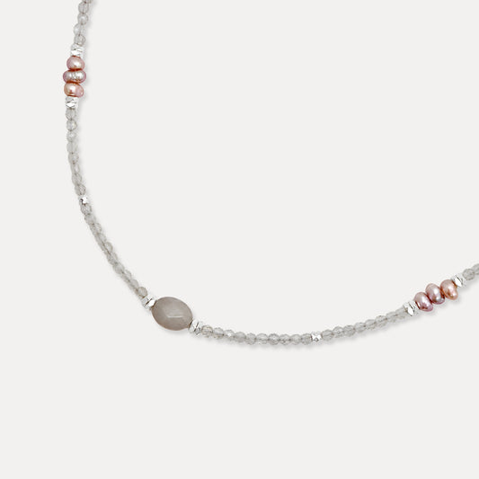 Close-up of gray labradorite beads freshwater pearls and silver-tone accents