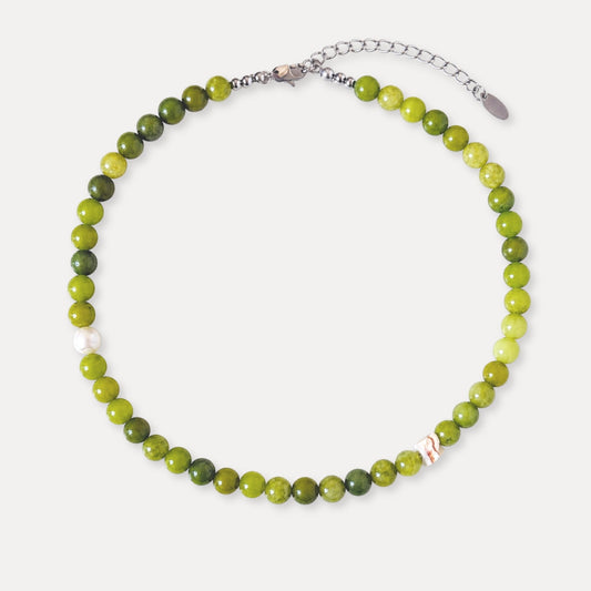 Olive green stone beaded necklace with freshwater pearl and shell accents.
