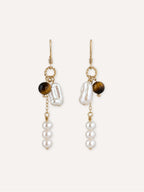 Pair of Orbit tiger eye and freshwater pearl drop earrings with 14K gold-filled ear wires and chains.