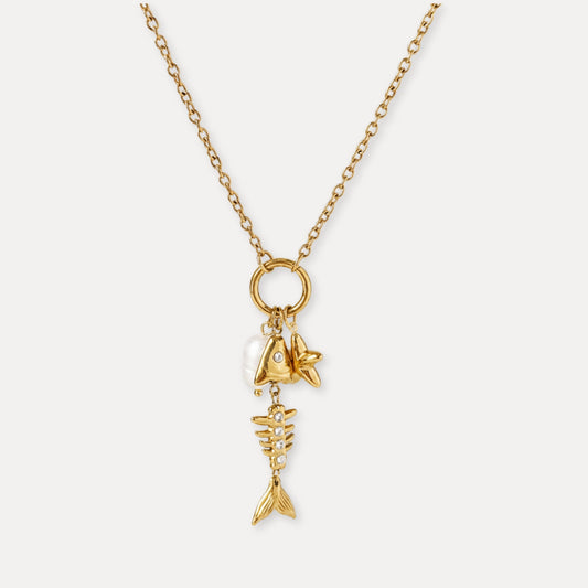 Gold charm necklace with fishbone, fish, starfish, white bead, and zircon details.