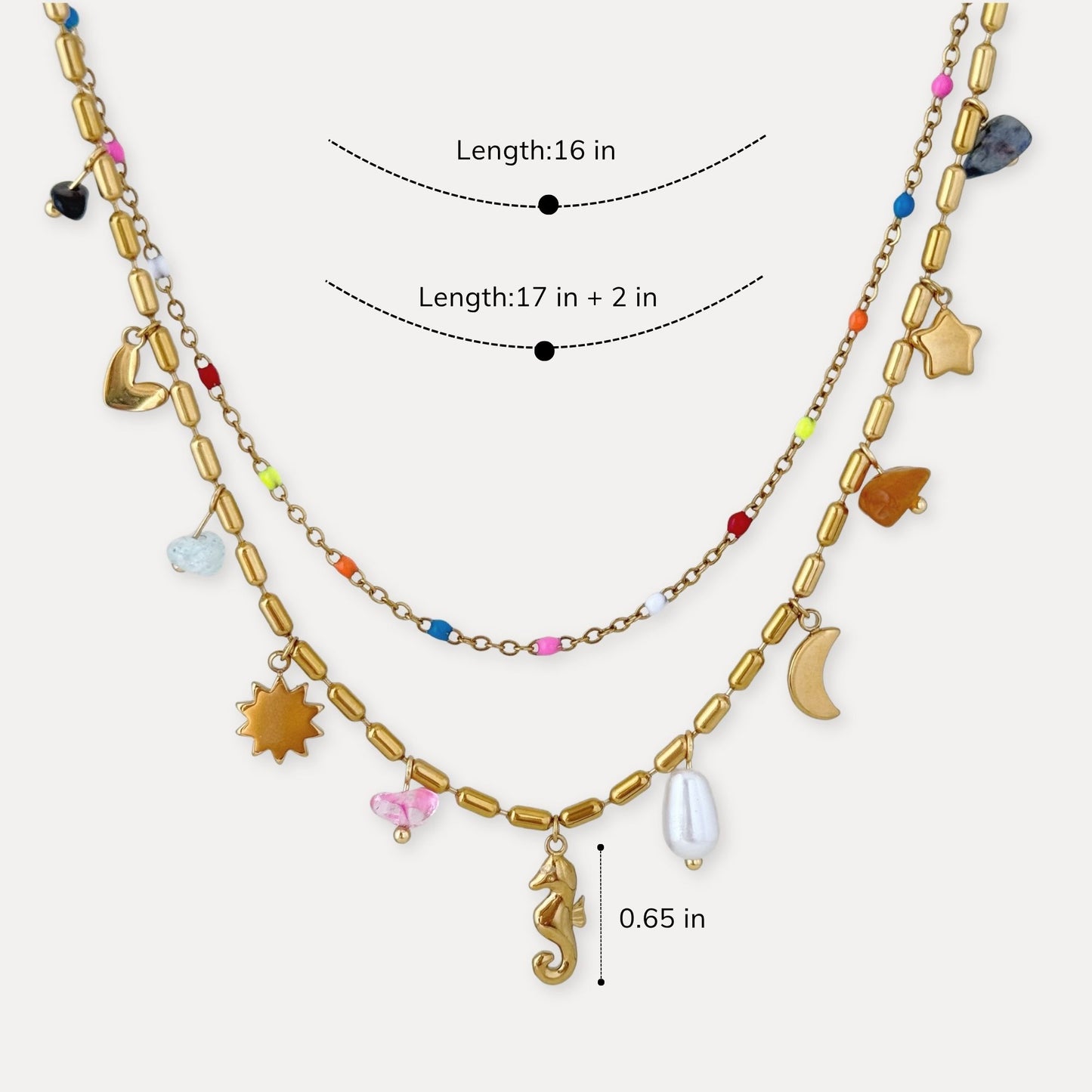 Layered charm necklace shown with 16 inch and 17 inch plus 2 inch adjustable lengths.
