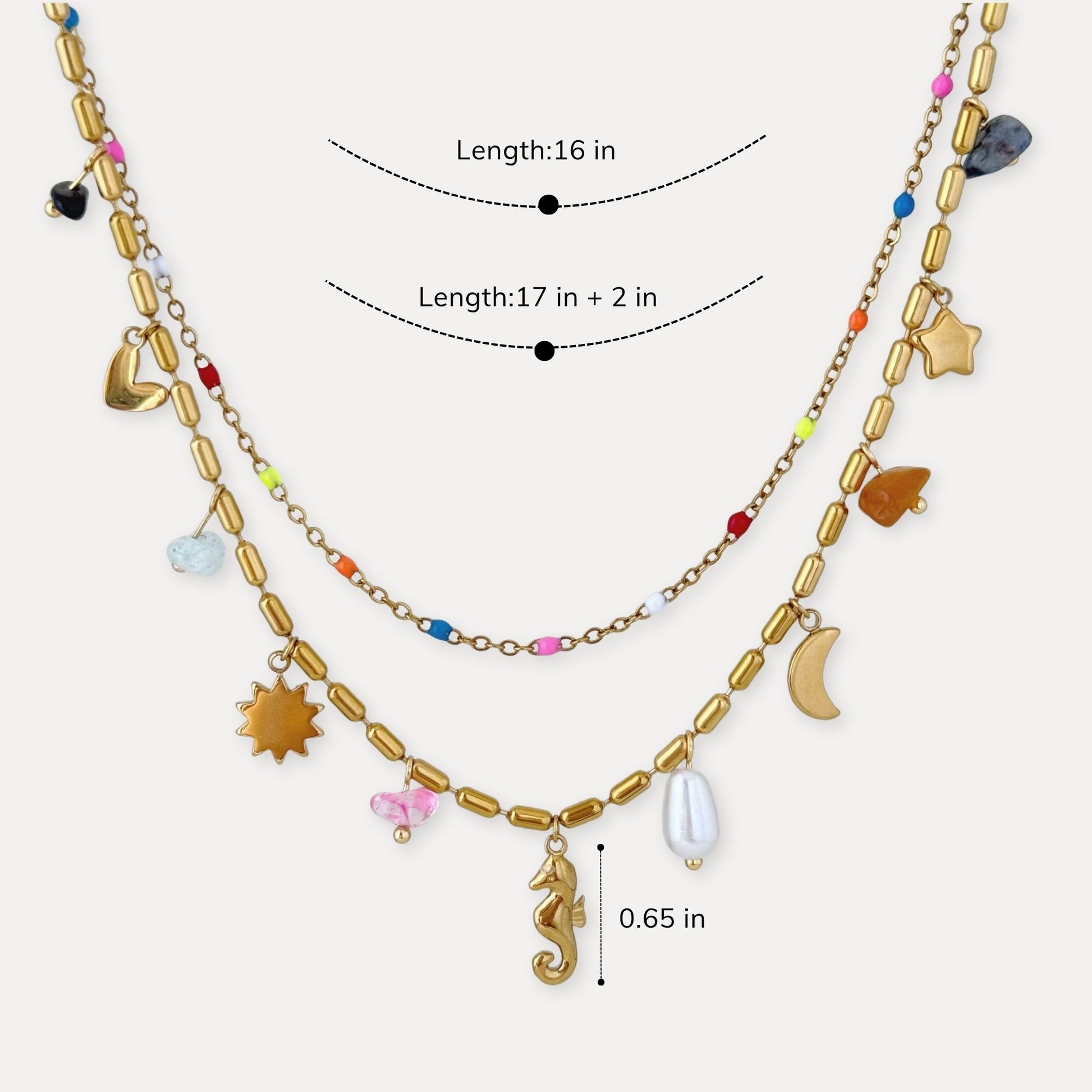 Layered charm necklace shown with 16 inch and 17 inch plus 2 inch adjustable lengths.