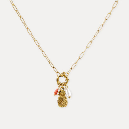 Gold pineapple charm necklace with freshwater pearl and natural stone accents.