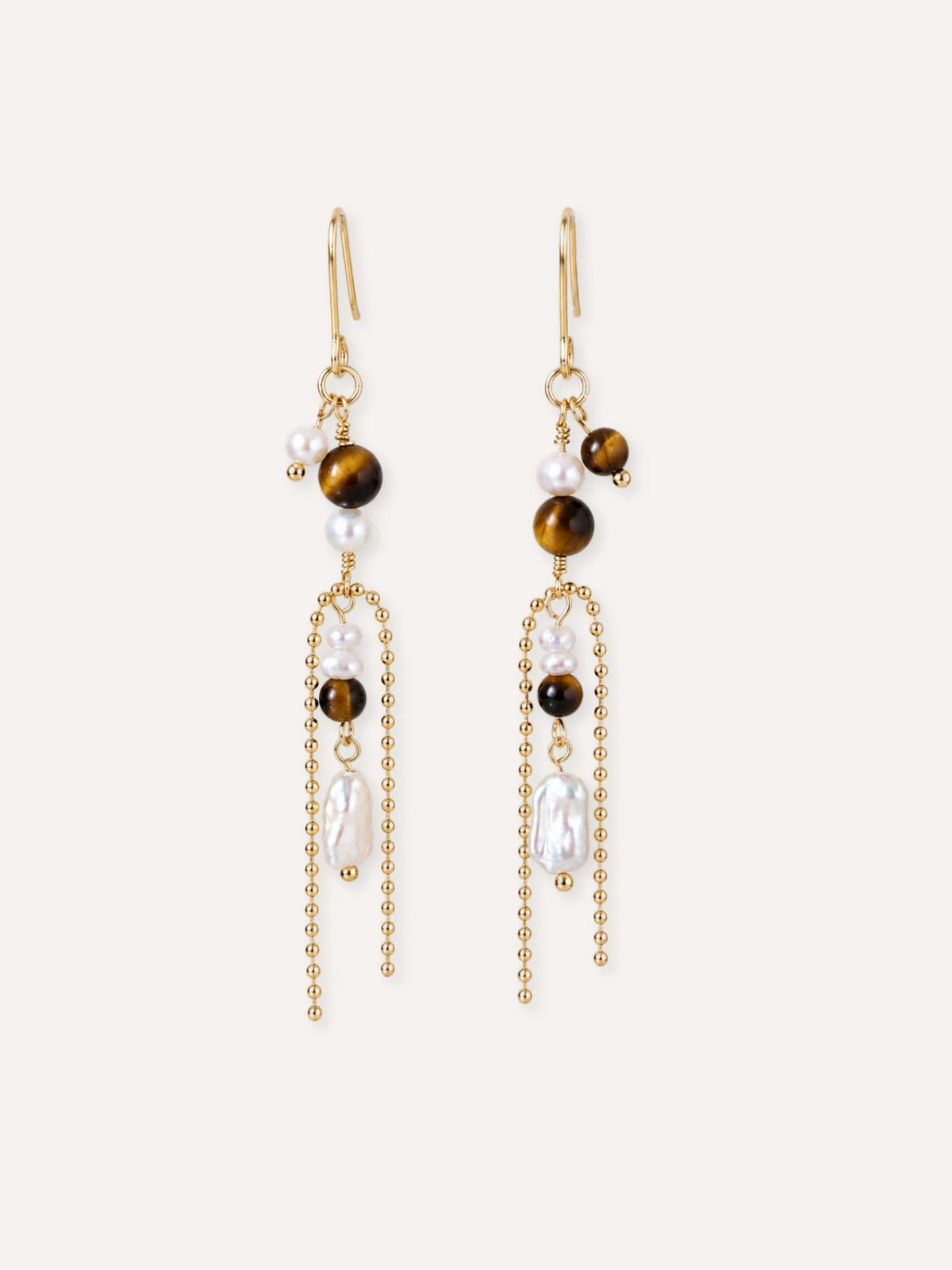 Pair of Tether tiger eye and freshwater pearl earrings with baroque pearl accents and long chain drops.